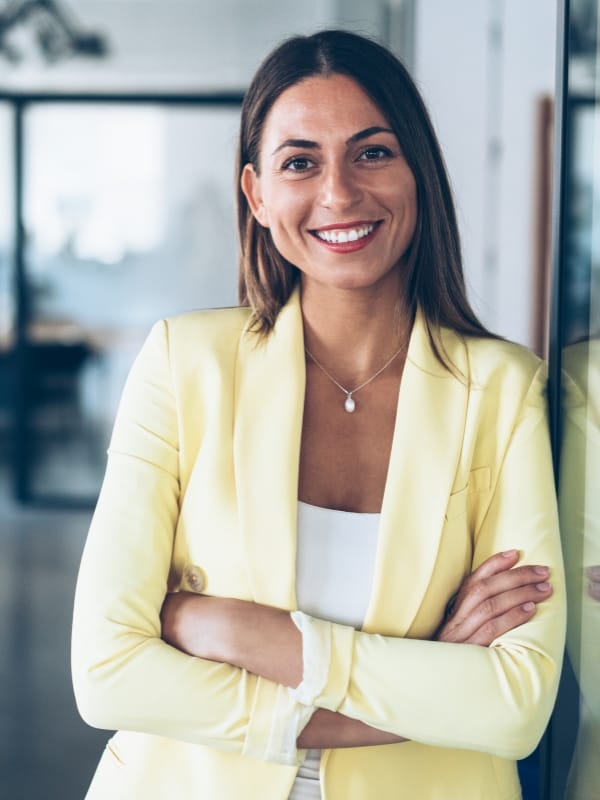 Yellow jacket portrait Female real estate agent in lemon yellow blazer.